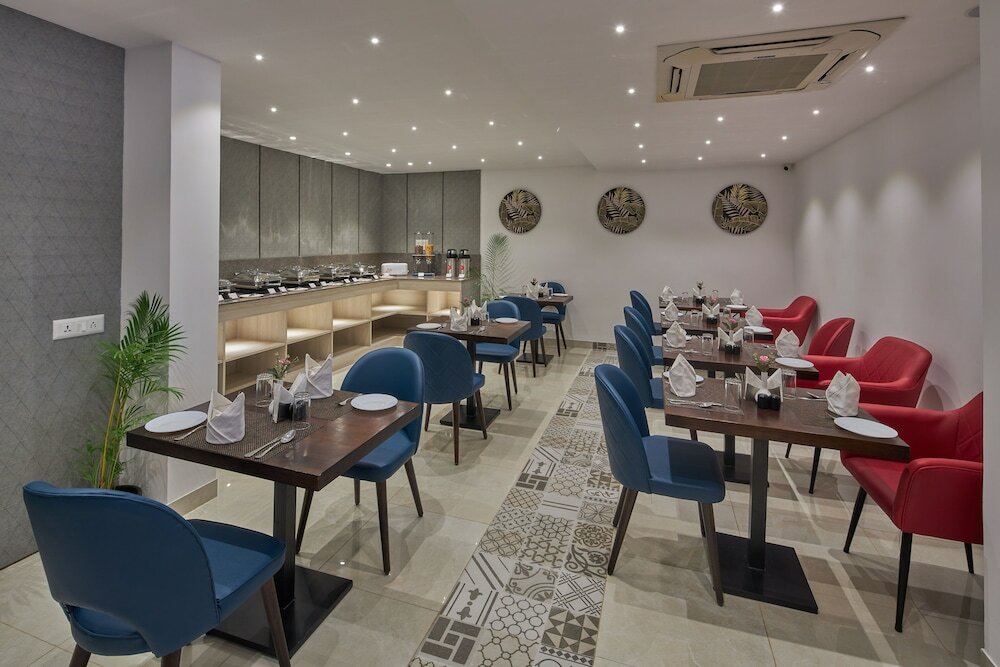 Фото Regenta Inn 4th Block Koramangala