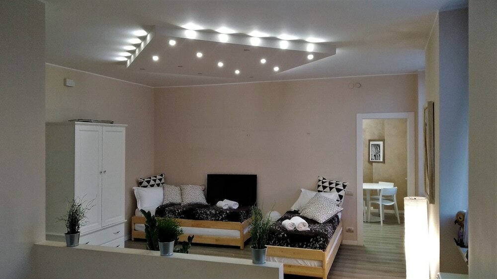 Фото Marconi Rooms - Loggia delle Erbe