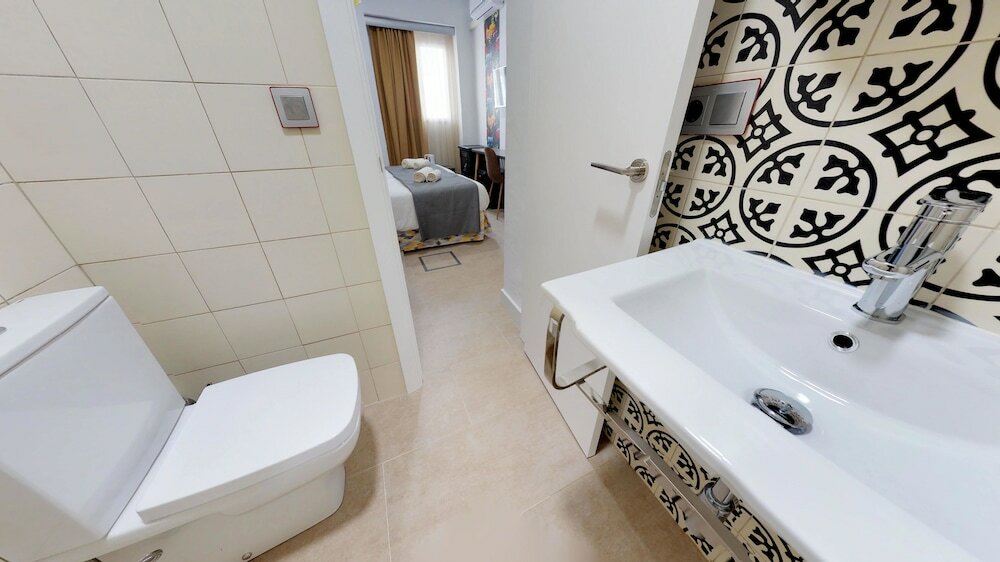 Фото Hostal Boutique La Española by Bossh Hotels