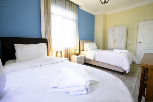 Апартаменты Central and Comfy Flat With Balcony in Muratpasa в Муратпаше