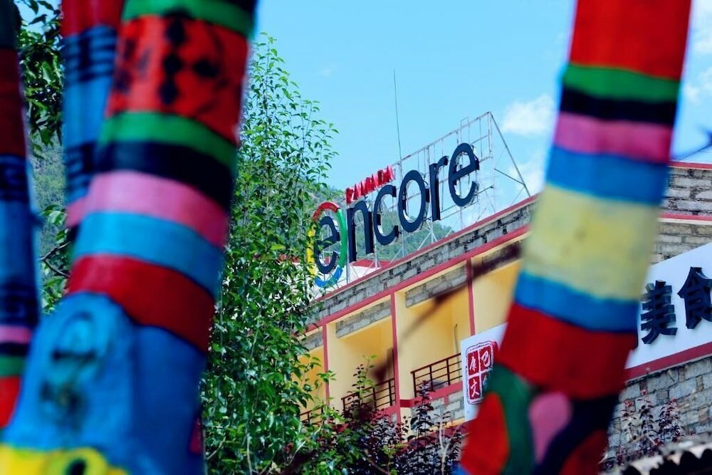 Фото Ramada Encore DaochengYading