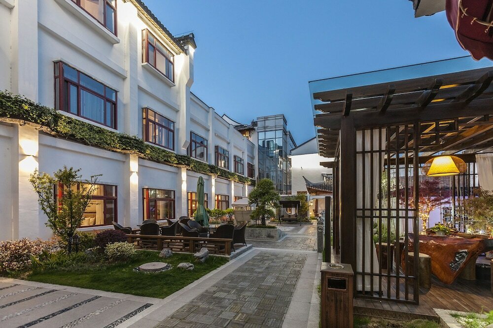 Фото Hejing Chengshang Generations Hotel