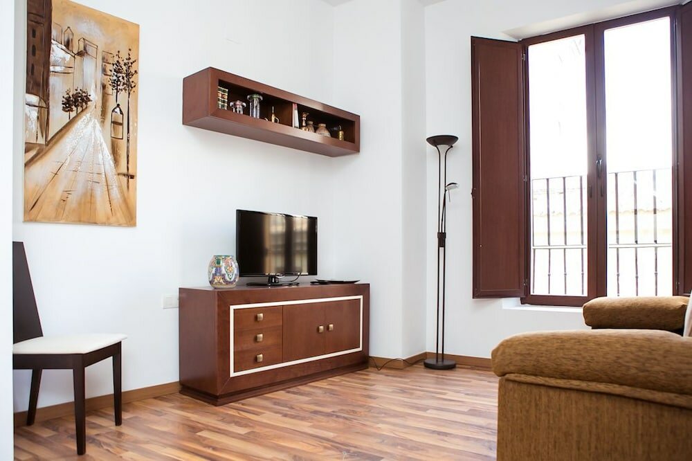 Фото Apartamentos Casa de la Lonja