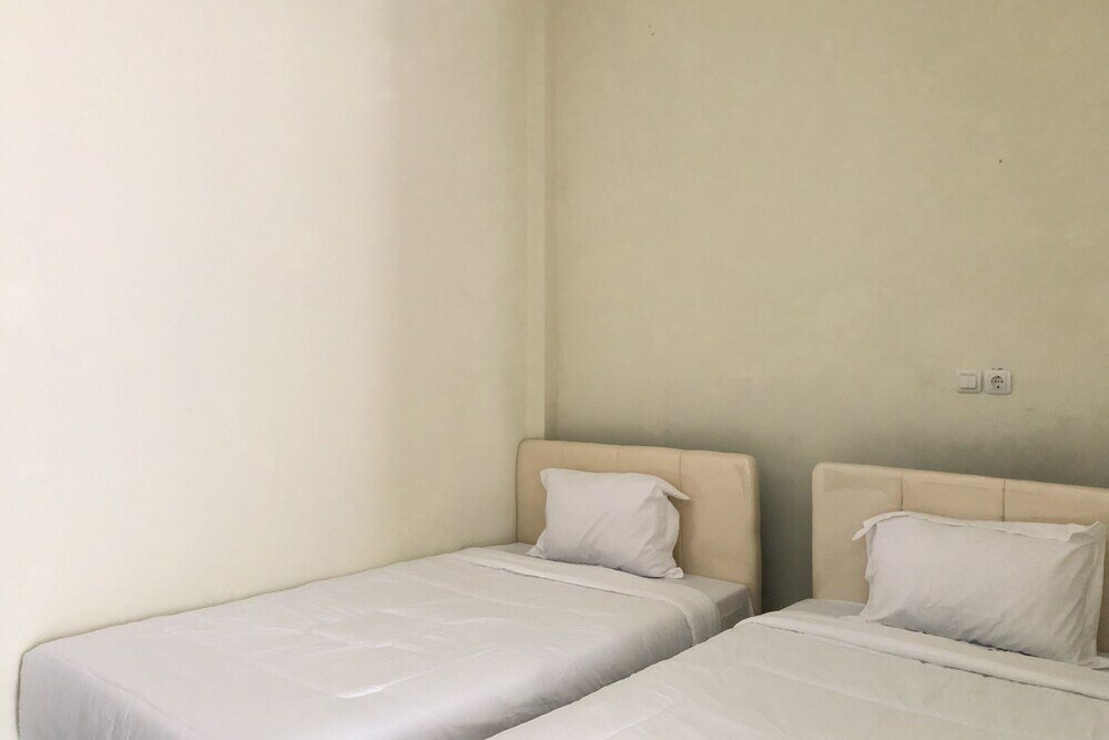 Фото Oyo 90299 Corner Guest House