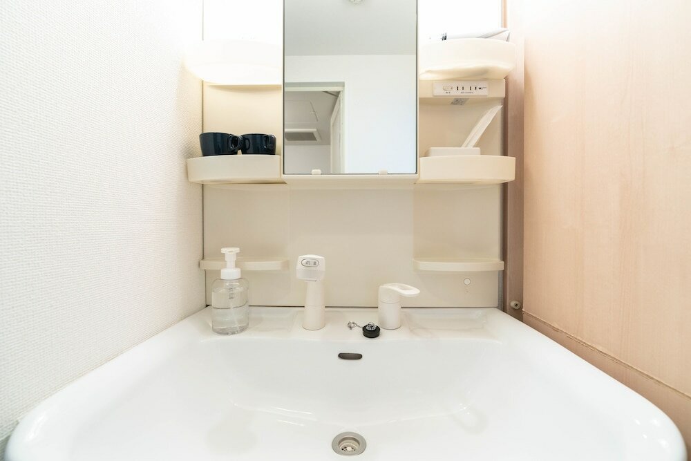 Фото Shinsaibash East Nana Apartment · Junan