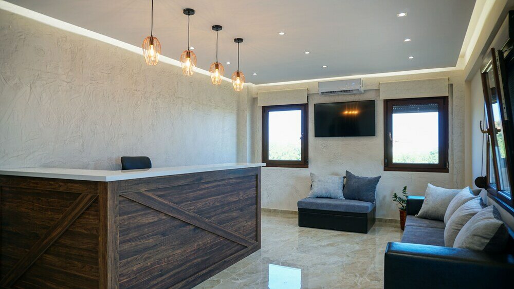 Фото Sinodinos Deluxe Apartments