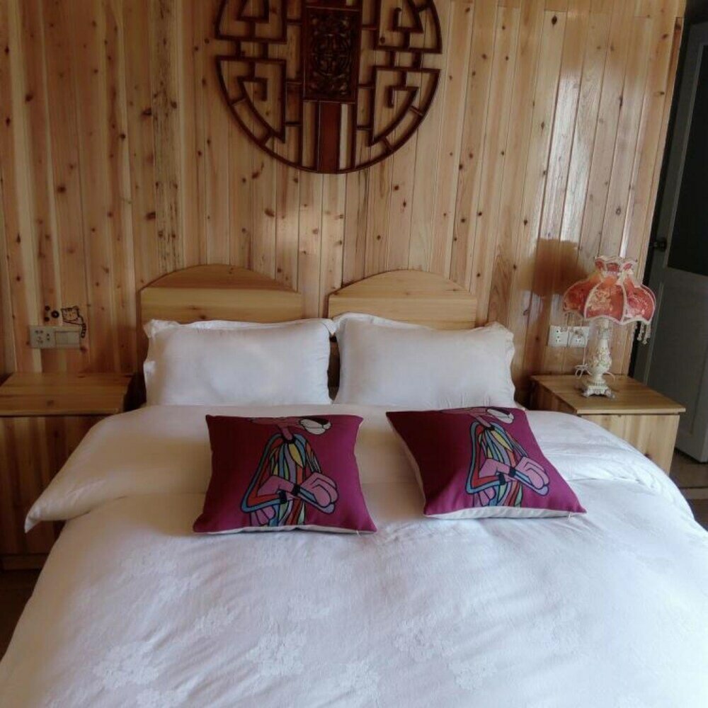 Фото Fenghuang Nanmu Inn No. 1