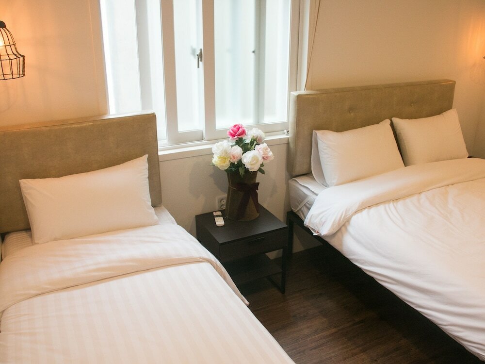 Фото Hi Jun Guesthouse