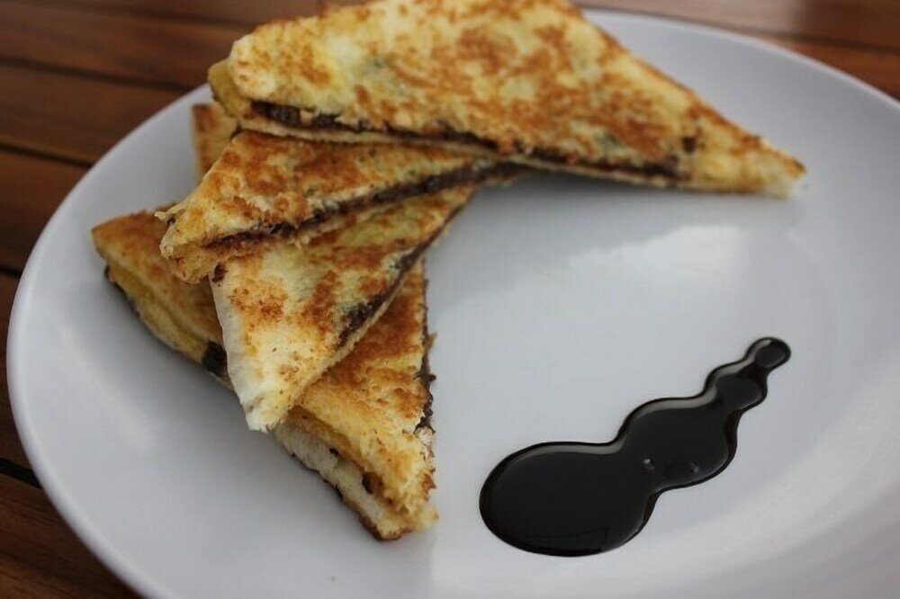 Фото The Sarining Hotel