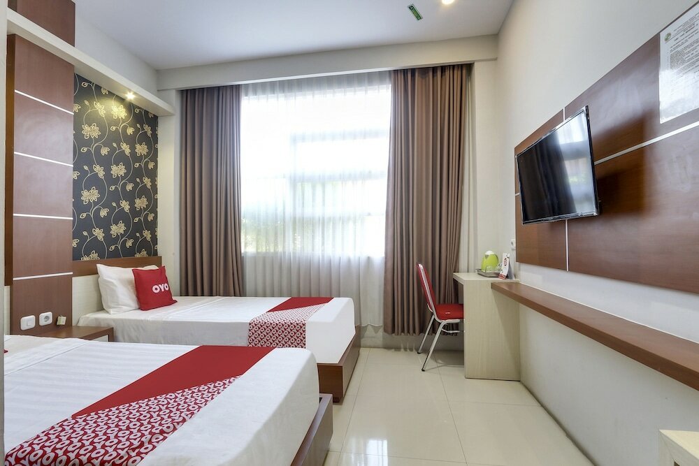 Фото Oyo Flagship 90973 Hotel Karunia Pkpri