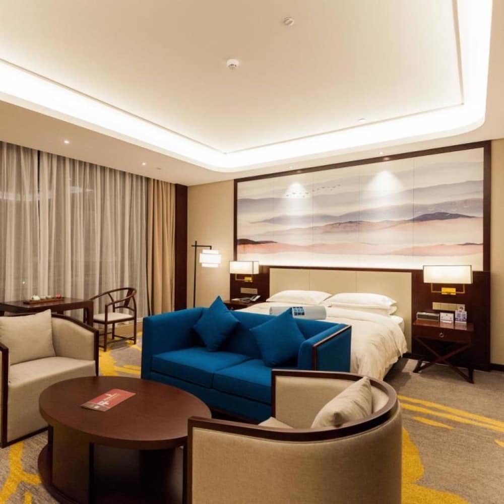 Фото Jinyi Jinglan Hotel