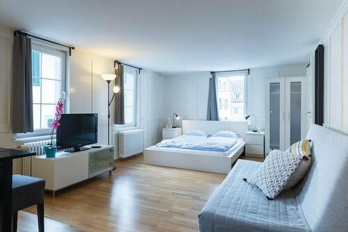 Гостиница Zg Zeughausgasse i - Hitrental Apartment в Цуге