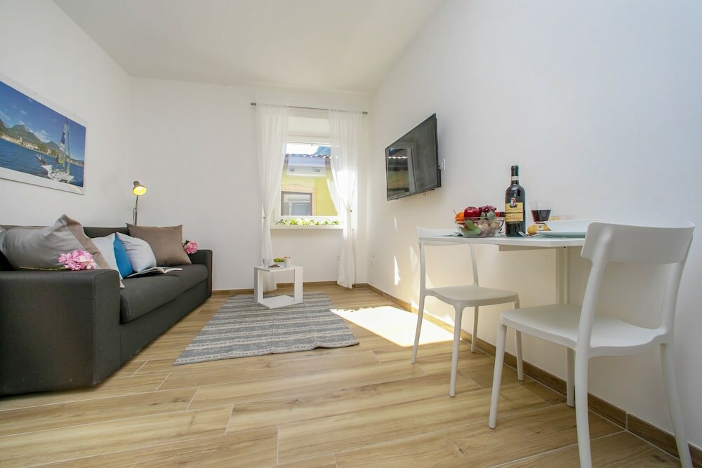 Фото Nido sui Tetti di Riva del Garda