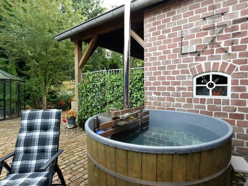 Гостиница Cozy Free Holiday Home in Musselkanaal With Hot Tub