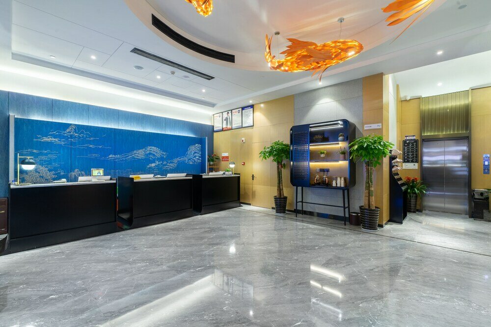 Фото Yì Wū Shì Bó Yì Měi Jū Hotel