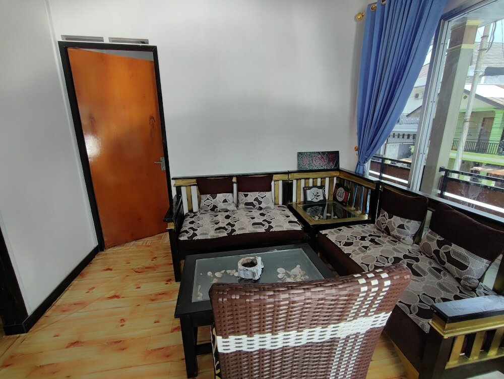 Фото Oyo 92357 Zzip Homestay