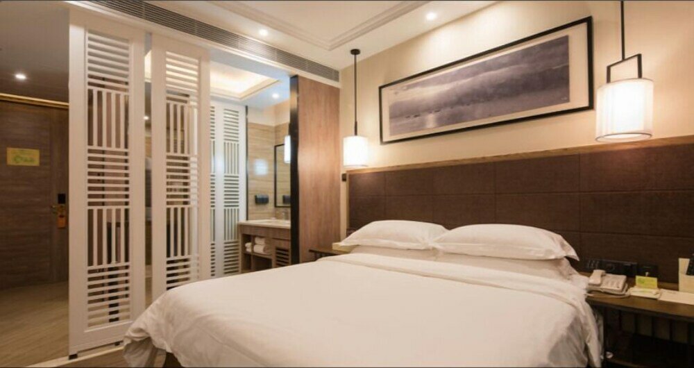 Фото Auden International Hotel