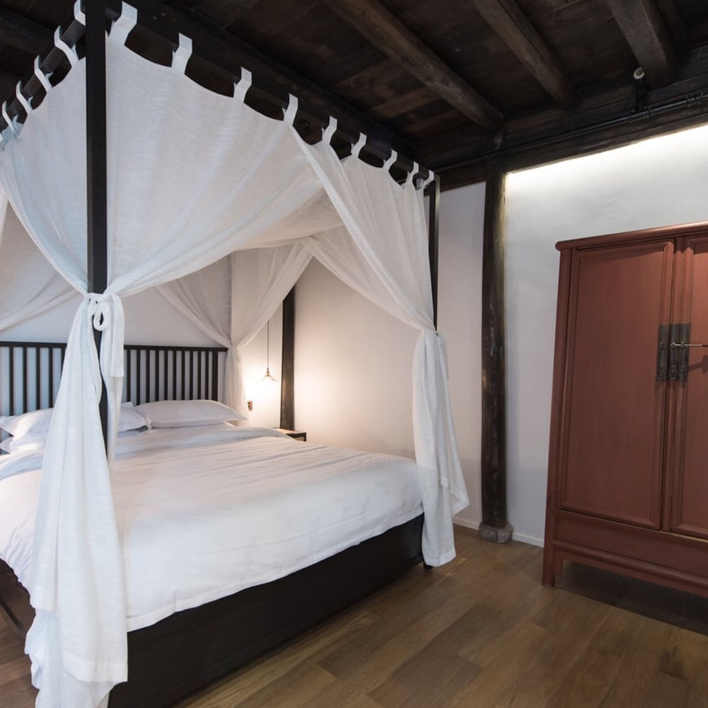 Фото Xiaochaguniang minsu