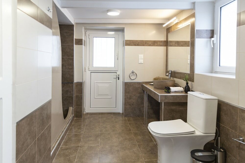 Фото Captain's House Suites