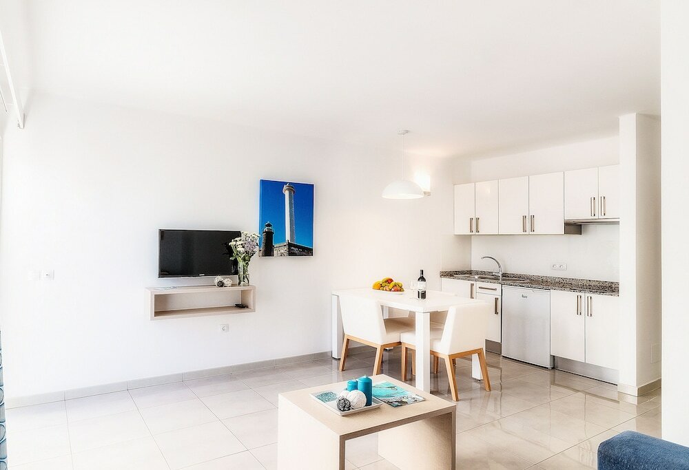 Фото Apartamentos Livvo Oasis