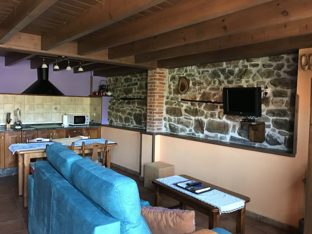 Фото Apartamentos Rurales La Portiella