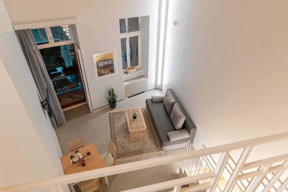 Фото Ether Loft Suites