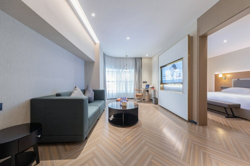 Фото Gz Baiyun Airport MeHood Liz Hotel T1