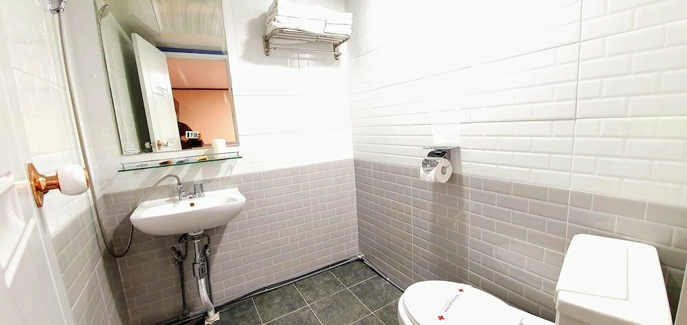 Фото New Sun Guesthouse Myeongdong