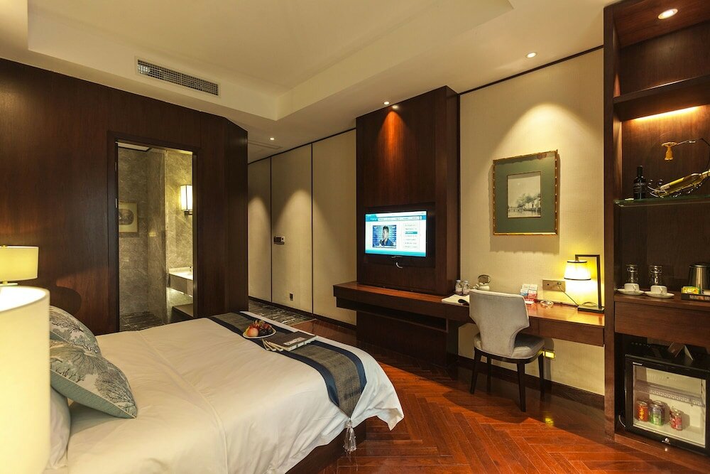 Фото Hejing Chengshang Generations Hotel