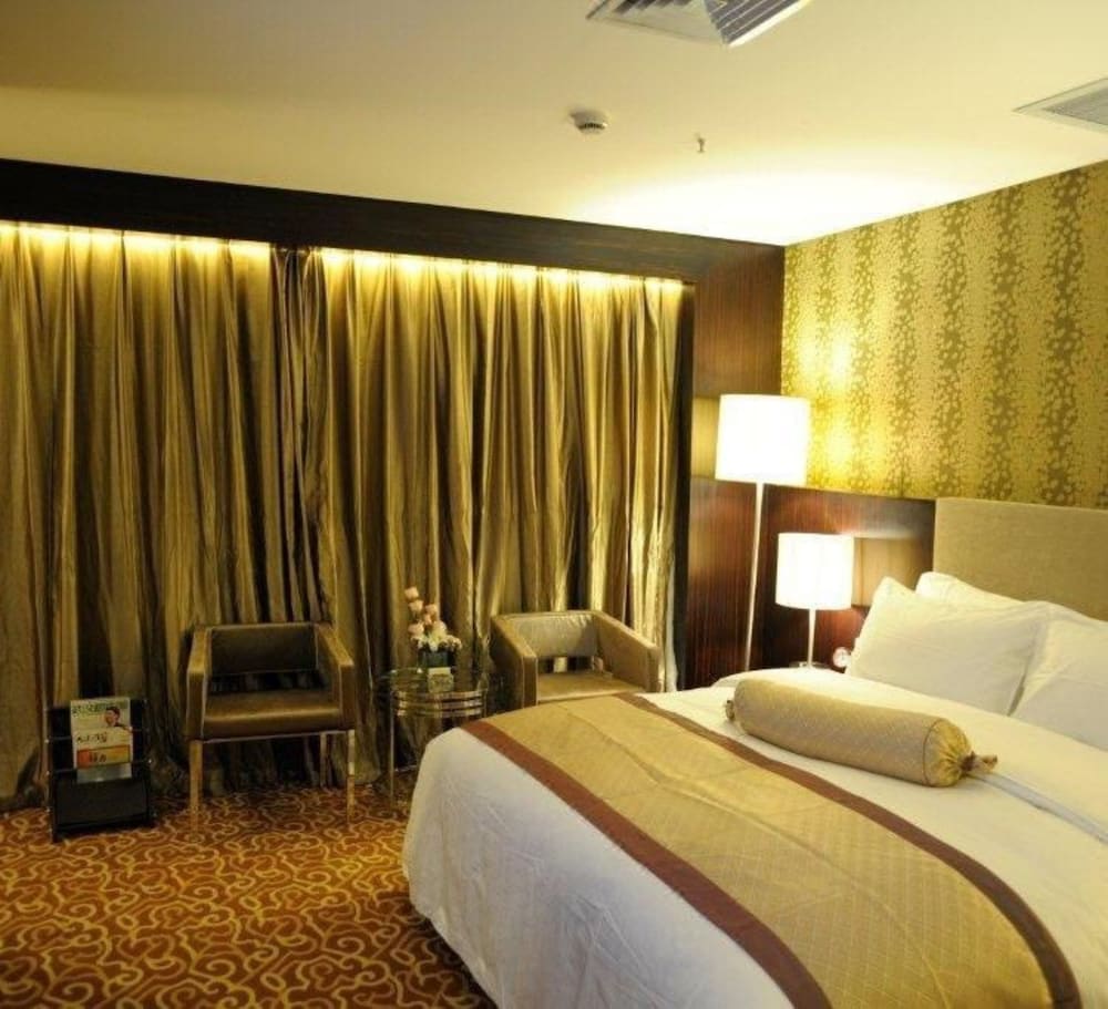 Фото Junyi Wangchao Hotel