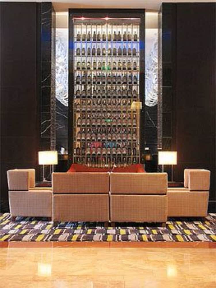 Фото Grand New Century Hotel Binhai Tianjin