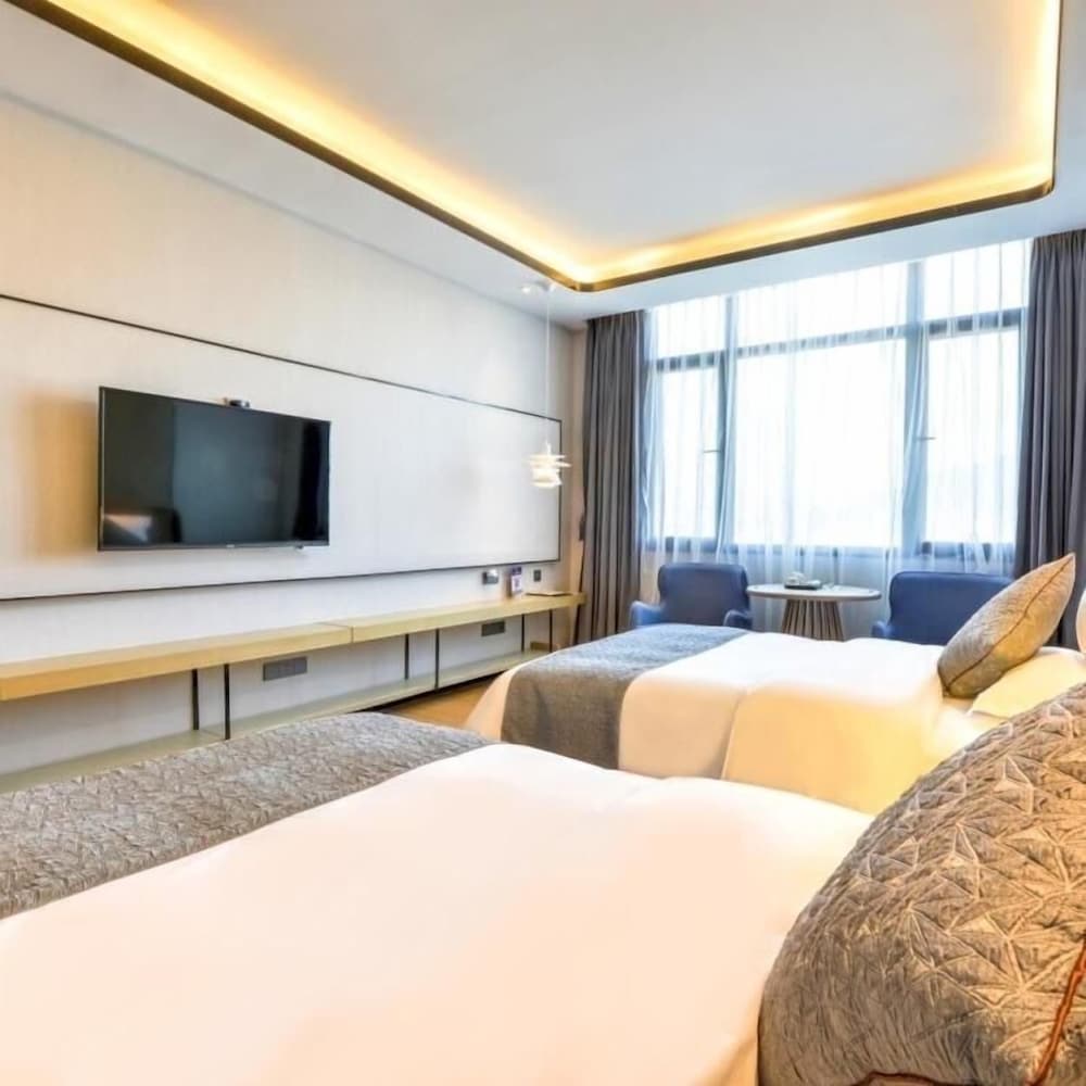 Фото Sibeisi International Hotel