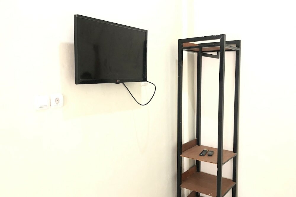 Фото Oyo 90299 Corner Guest House