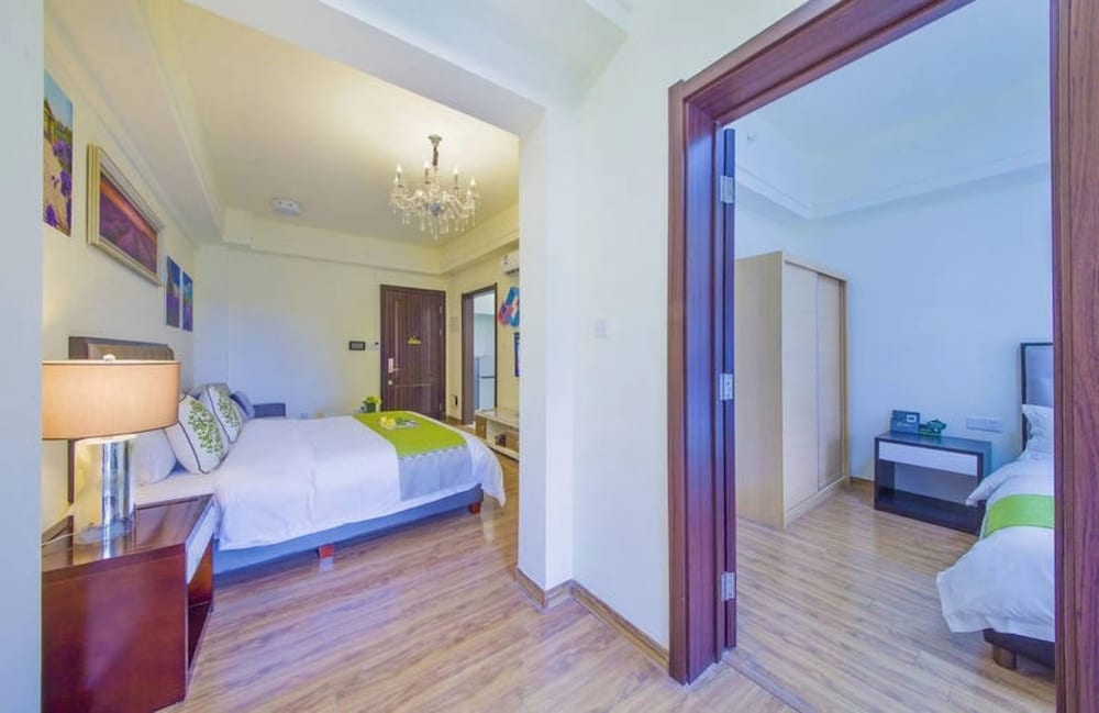 Фото BaiHe International Apartment Hotel