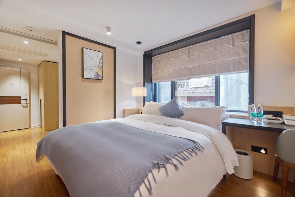 Фото Wuhua Xingxiang Shanfang Hotel