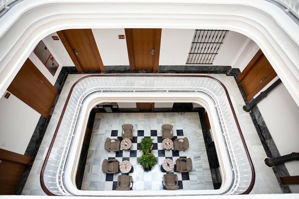 Фото Plazuela del Carbón Suites