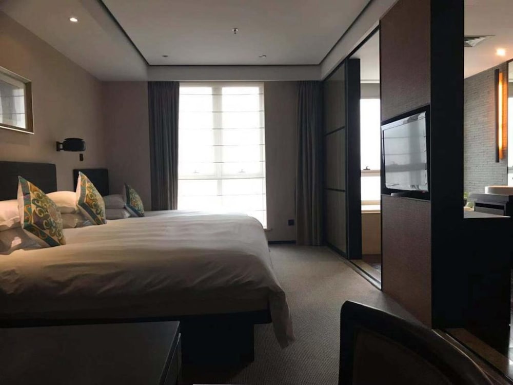 Фото Ssaw Boutique Hotel Xiaoshan City Center