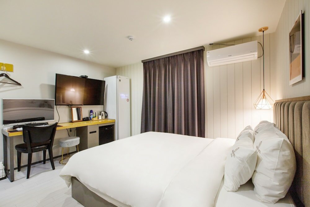 Фото Brown Dot Hotel Minam