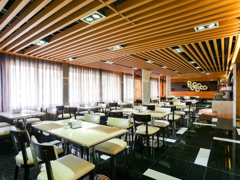 Фото Guangzhou Easun Guotai Hotel