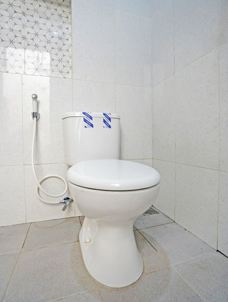 Фото OYO 92435 Sunlo Cozy Home Family Homestay Syariah