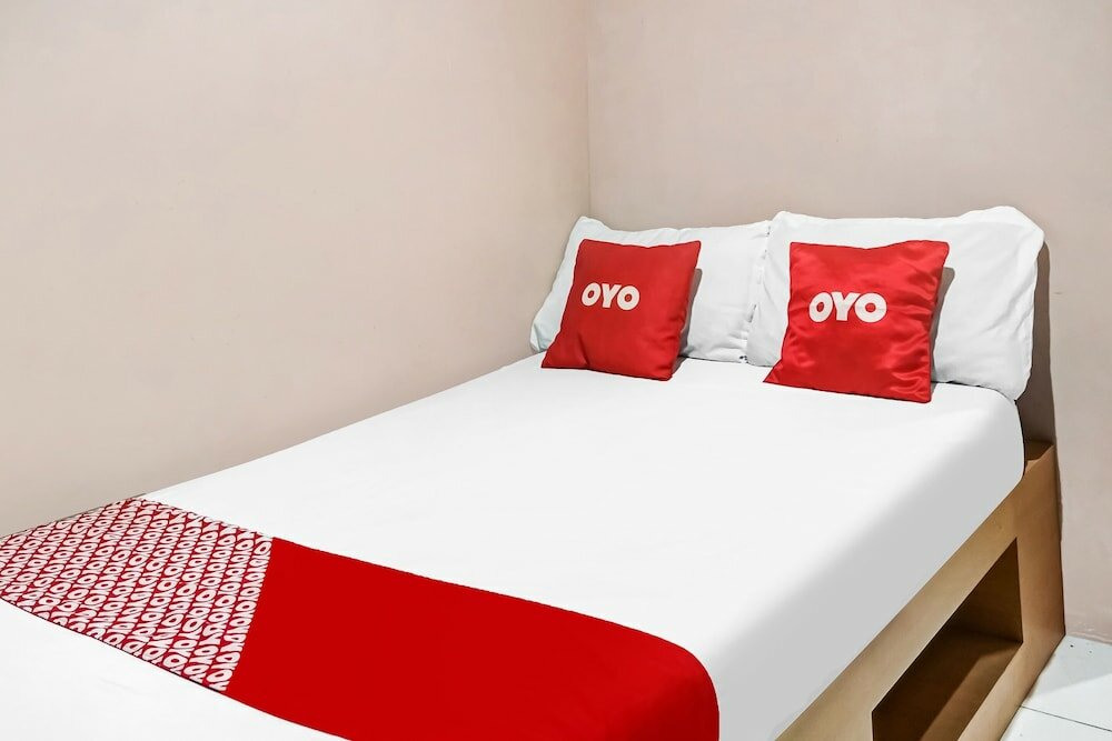 Фото Spot On 91336 Guesthouse Tarumanegara