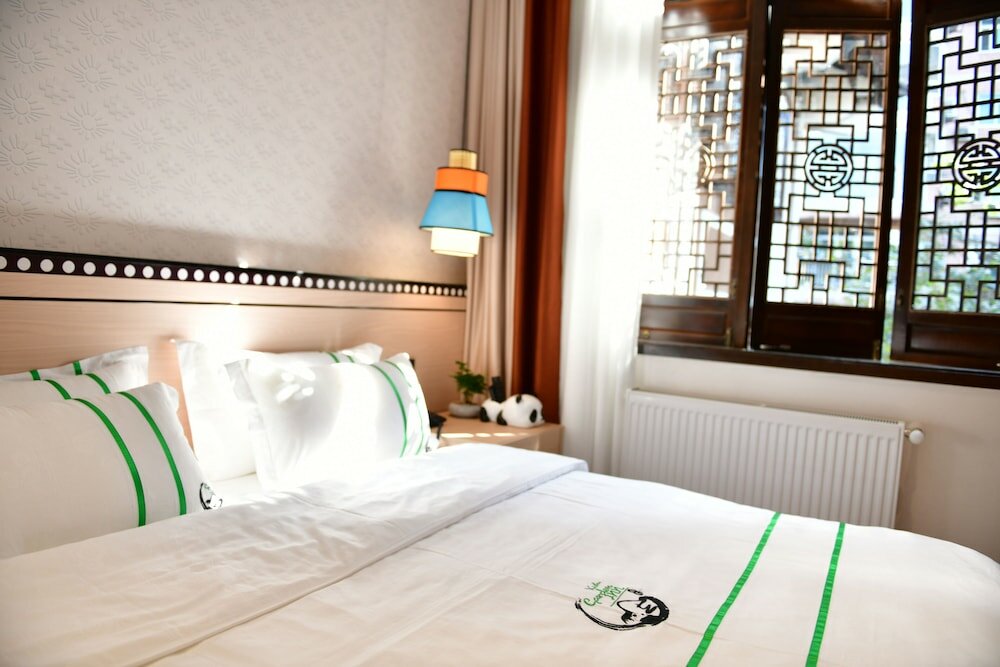 Фото Xishu Garden Inn