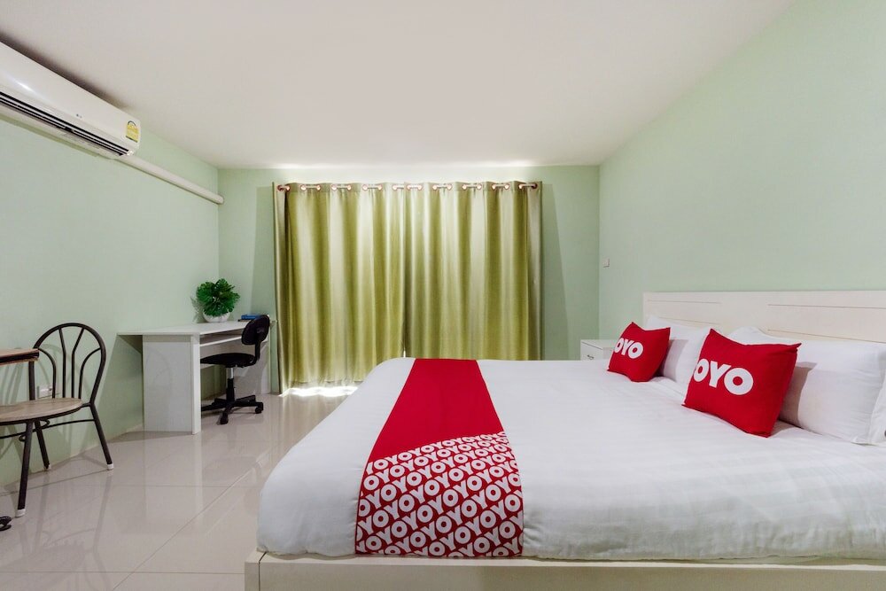 Фото Oyo 75363 V Place Apartment