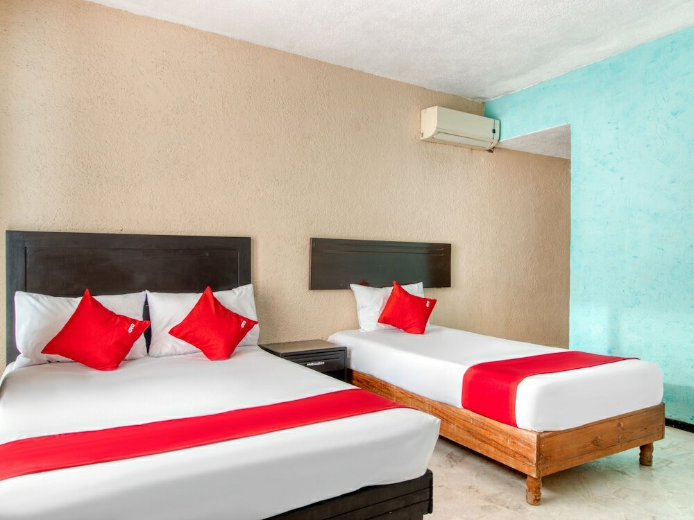 Фото Capital O Hotel La Siesta, Gómez Palacio