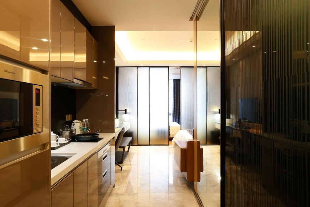 Фото Pengman International Apartment Hotel