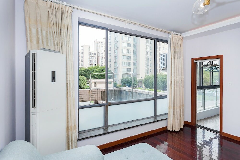Фото Good Time Travellers Inn- Shanghai New International Expo Apartment