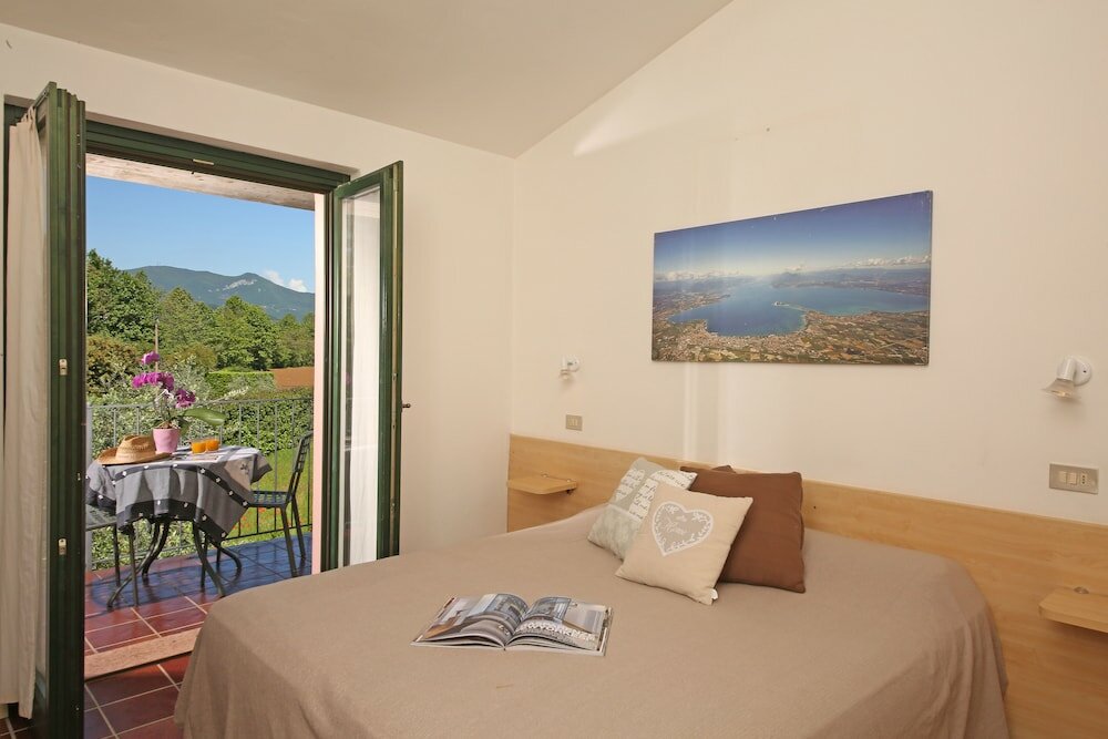 Фото Casa per Ferie Garda Il Melograno