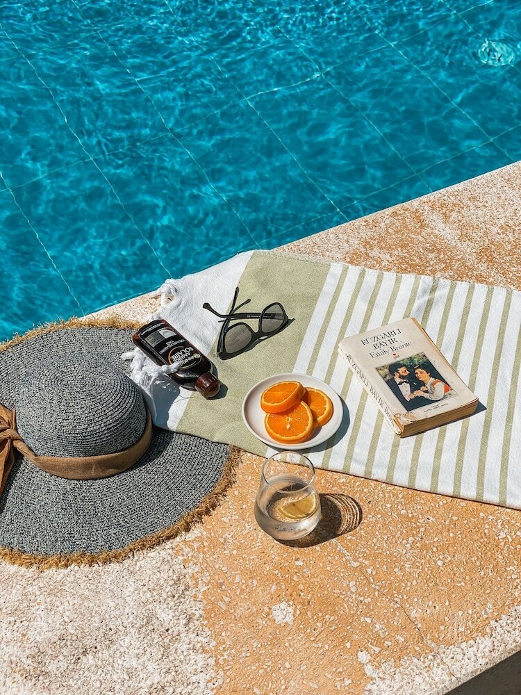 Фото Foça İlçayto Rooms