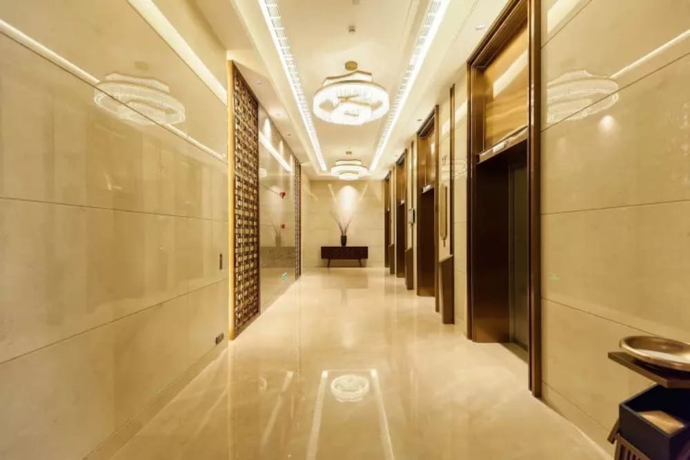 Фото Jinyi Jinglan Hotel