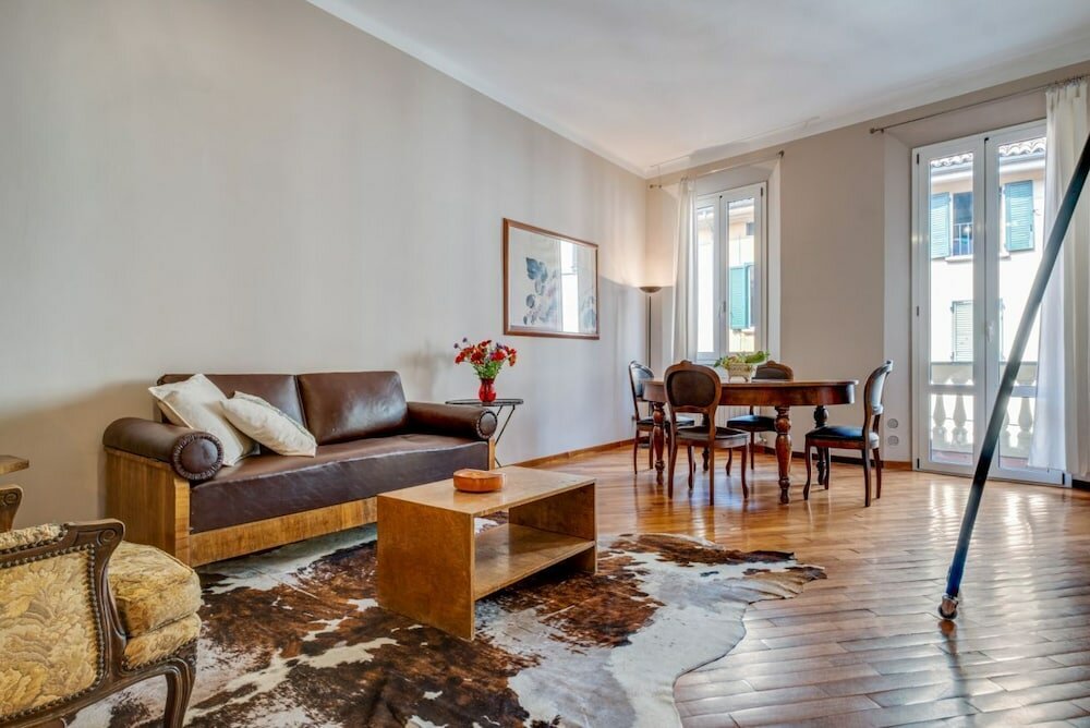 Фото A due passi dalla Pinacoteca Apartment